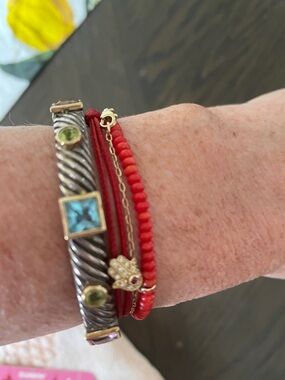 Sterling silver cuff with gemstones bezel set in 14k gold.